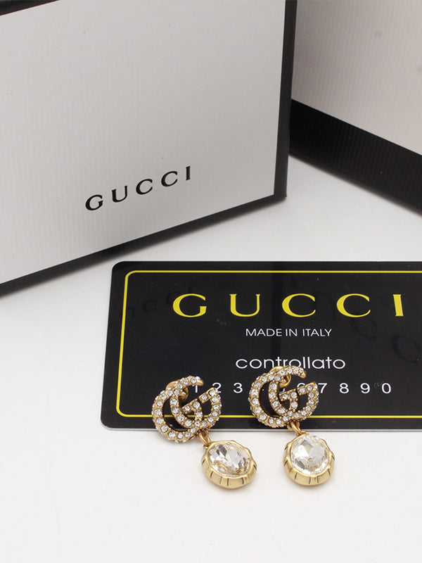 حلق قوتشي زركون انتيك حلق gucci ذهبي
