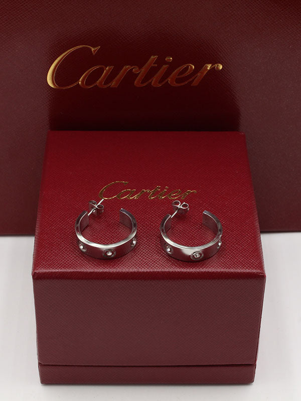 حلق كارتير فضي مدور حلق CARTIER