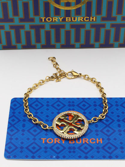 اساور توري بورش زركون مدوره اسواره tory burch