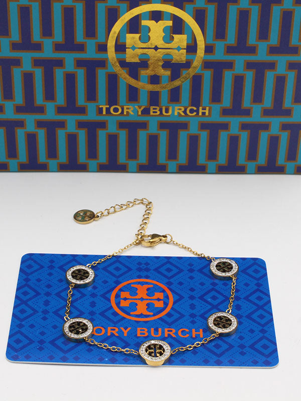 اساور توري بورش زركون وسط اسواره tory burch