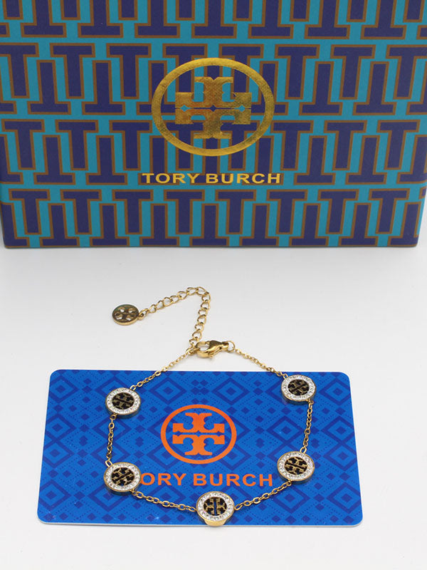 اساور توري بورش زركون وسط اسواره tory burch