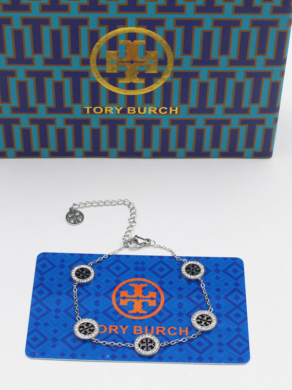 اساور توري بورش زركون وسط اسواره tory burch فضي