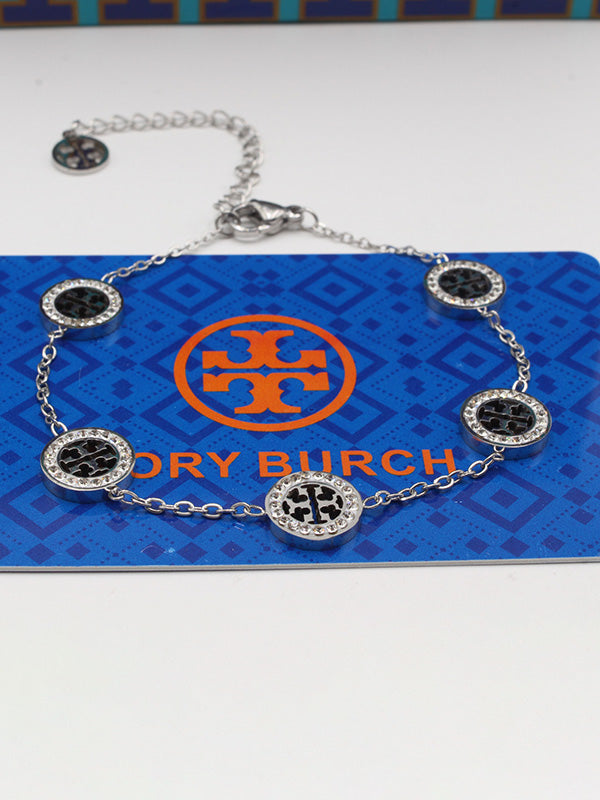 اساور توري بورش زركون وسط اسواره tory burch