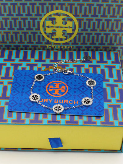 اساور توري بورش زركون وسط اسواره tory burch