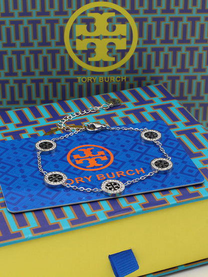 اساور توري بورش زركون وسط اسواره tory burch