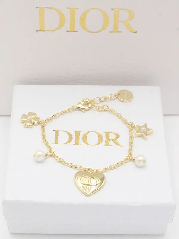 اساور ديور نيو بندنتس لوقو اسواره dior ذهبي