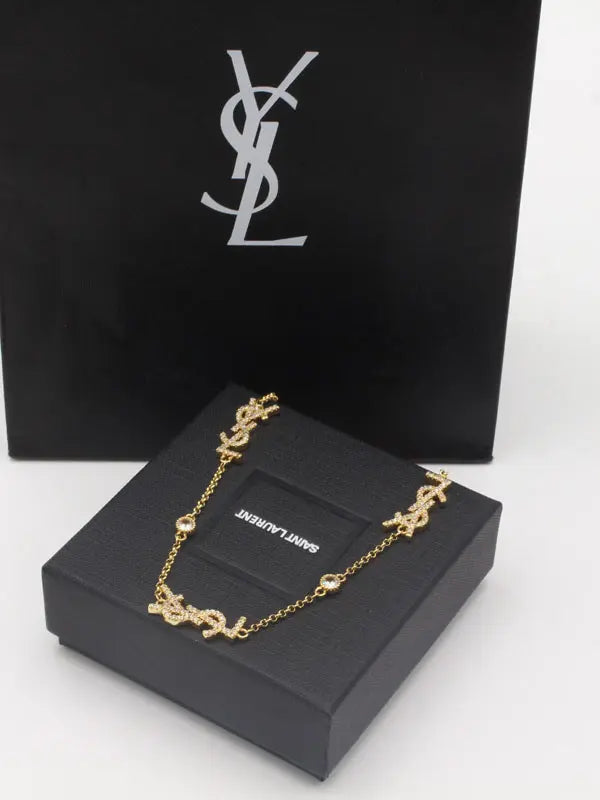 سلسال ايف سان لوران زركون لوقو سلسال ysl