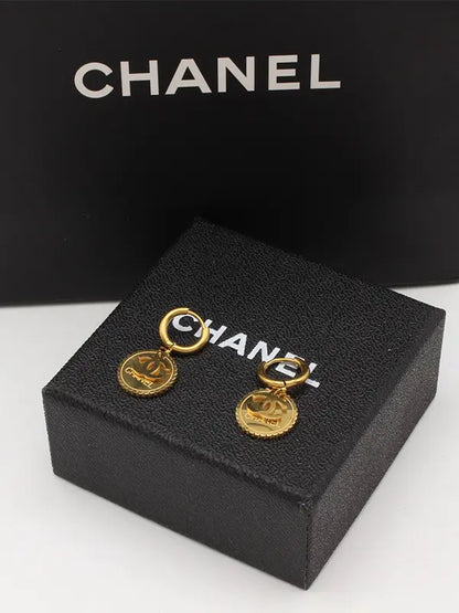 حلق شانيل ميتال ذهبي لوقو حلق chanel