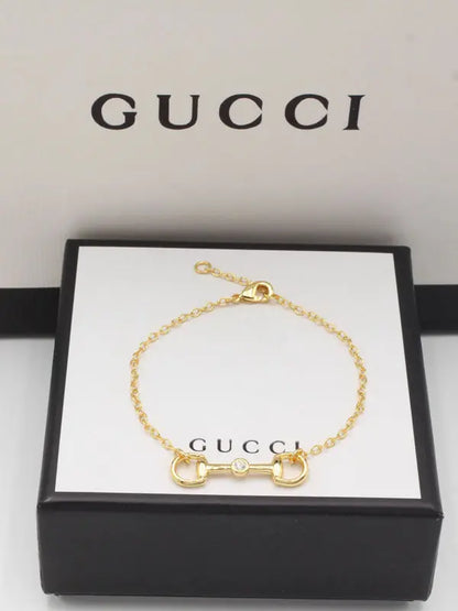 اسواره قوتشي نيو لوك لوقو 877 اسواره gucci ذهبي