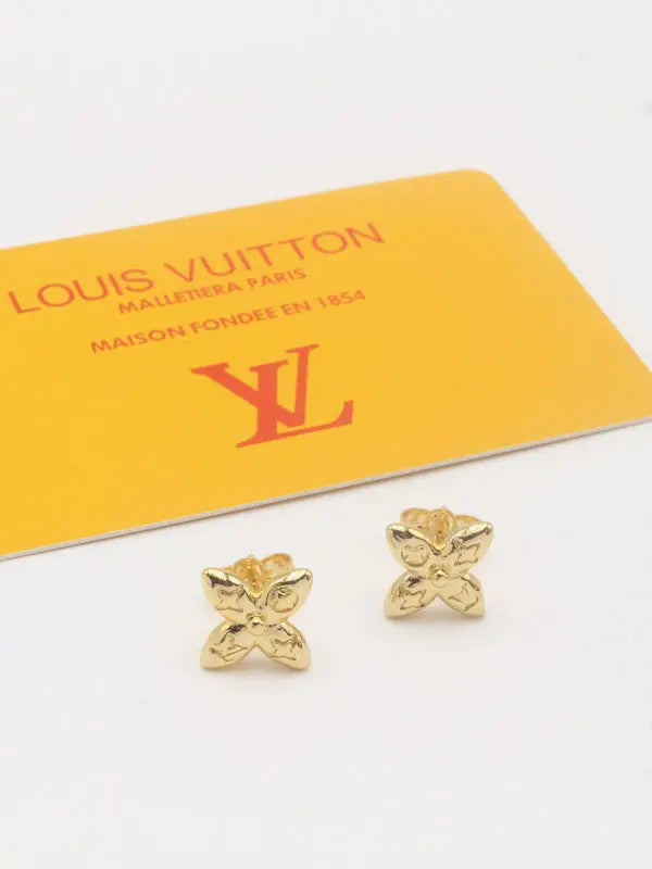 حلق لويس فيتون سمول لوقو 702 حلق louis vuitton ذهبي