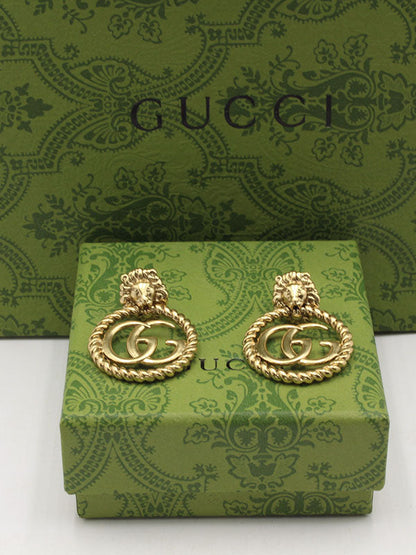 حلق قوتشي انتيك مدور كبير حلق gucci ذهبي