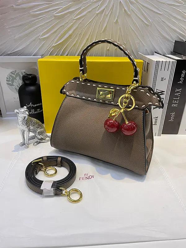 شنطة فندي بنية بتعليقه كرز شنط وحقائب fendi bags