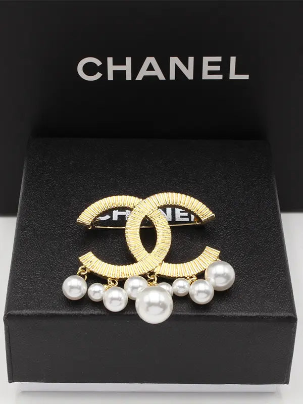بروش شانيل لولو 217 بروش chanel ذهبي