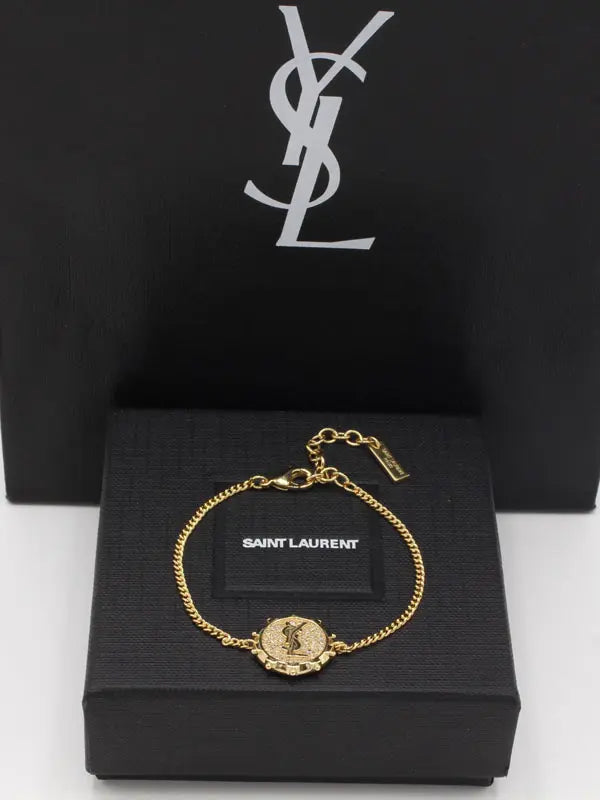 اساور ايف سان لوران 880 اسواره ysl ذهبي