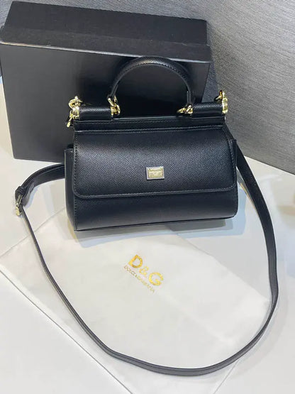 شنطة دولتشي قبانا اسود جلد ماستر شنط وحقائب tory burch