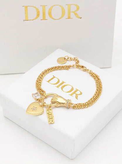 اساور ديور بيق هارت لوقو اسواره dior ذهبي