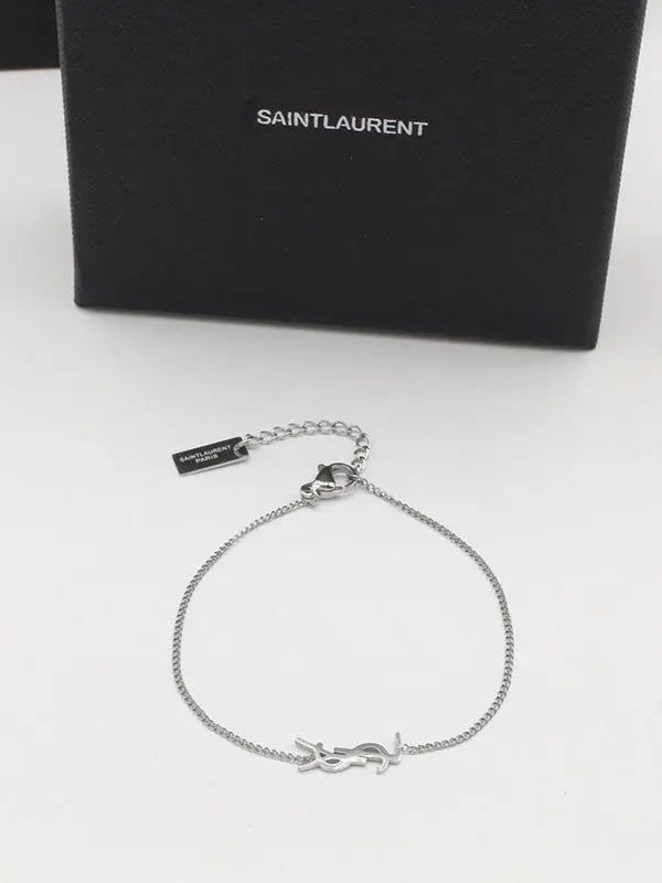 اسواره ايف سان لوران نيو سمبل شاين اسواره ysl فضي