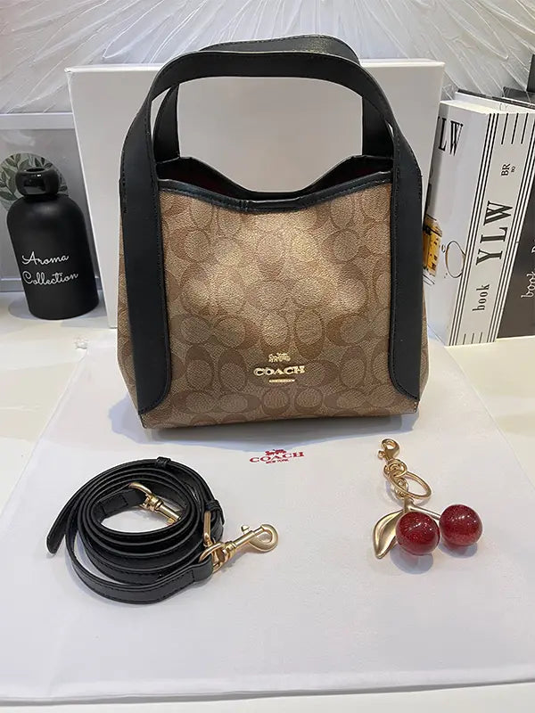 شنطة كوتش بنية شنط وحقائب coach bags