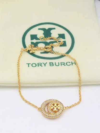 اسواره توري بورش زركون لوقو 869 اسواره tory burch ذهبي