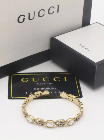اساور قوتشي انتيك 854 اسواره gucci ذهبي