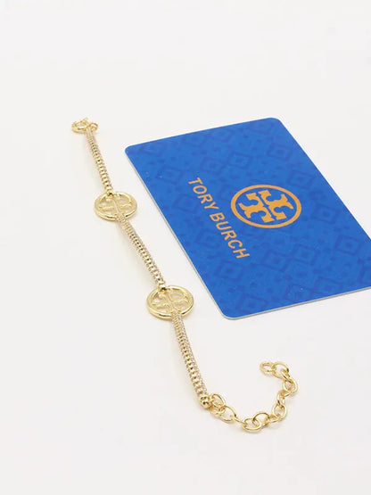 اساور توري بورش زركون ماستر اسواره tory burch ذهبي