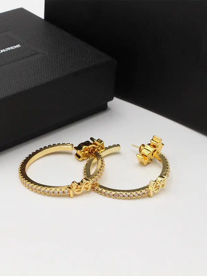 حلق ايف سان لوران زركون لوقو حلق ysl
