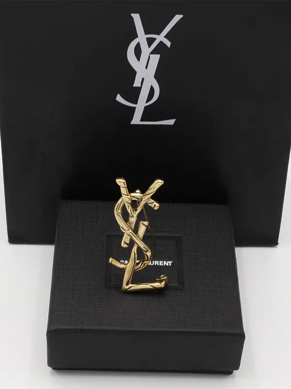 بروش ايف سان لوران انتيك قولد بروش ysl ذهبي