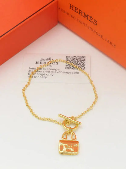 اساور هيرمز ماستر كي لوقو اسواره HERMES ذهبي