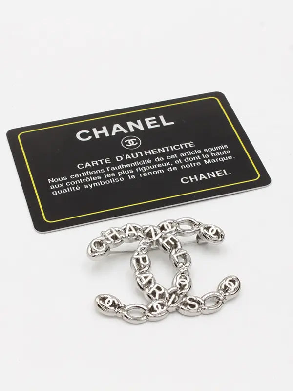 بروش شانيل ميتال لوقو 219 بروش chanel فضي