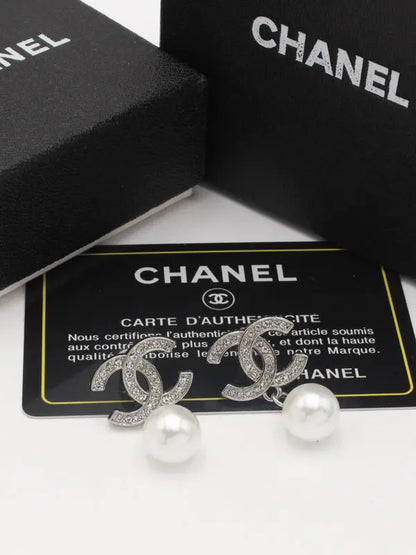 حلق شانيل الجديد 719 حلق chanel فضي
