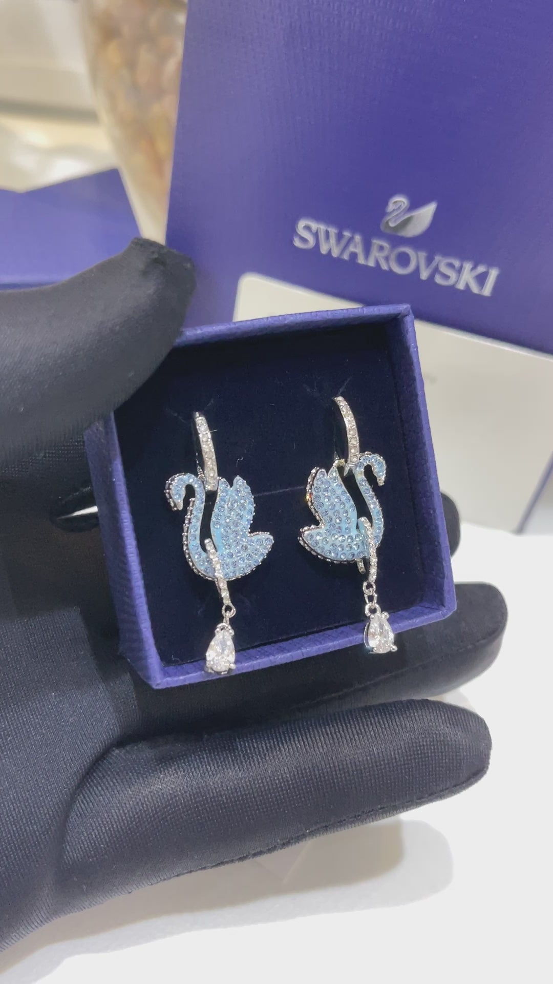 حلق سواروفسكي سوان زركون سماوي لوقو حلق Swarovski