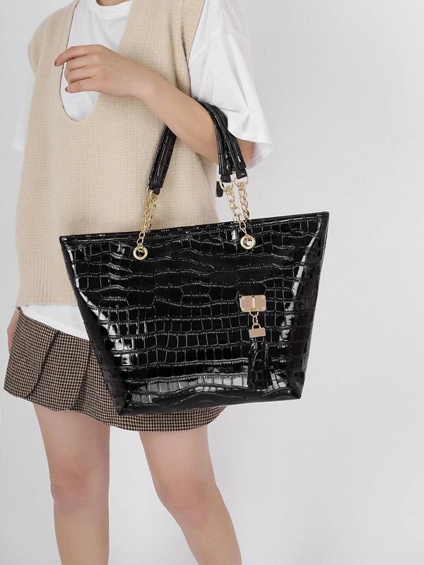 شنطة يد مزخرفة بنقش التمساح شنط وحقائب شنط اسود