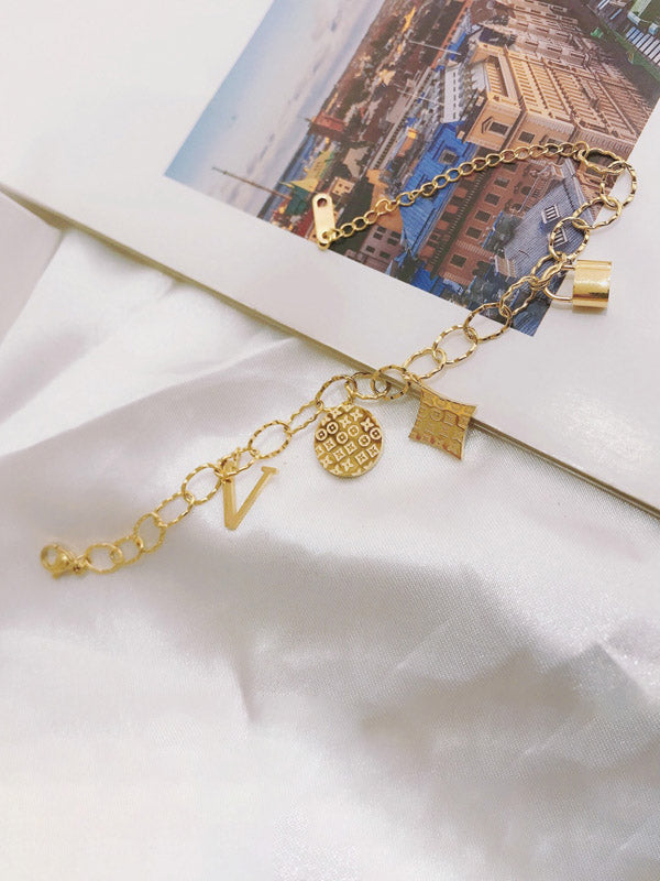 اسواره لويس فيتون ذهبية بتعليقات انيقة اسواره louis vuitton