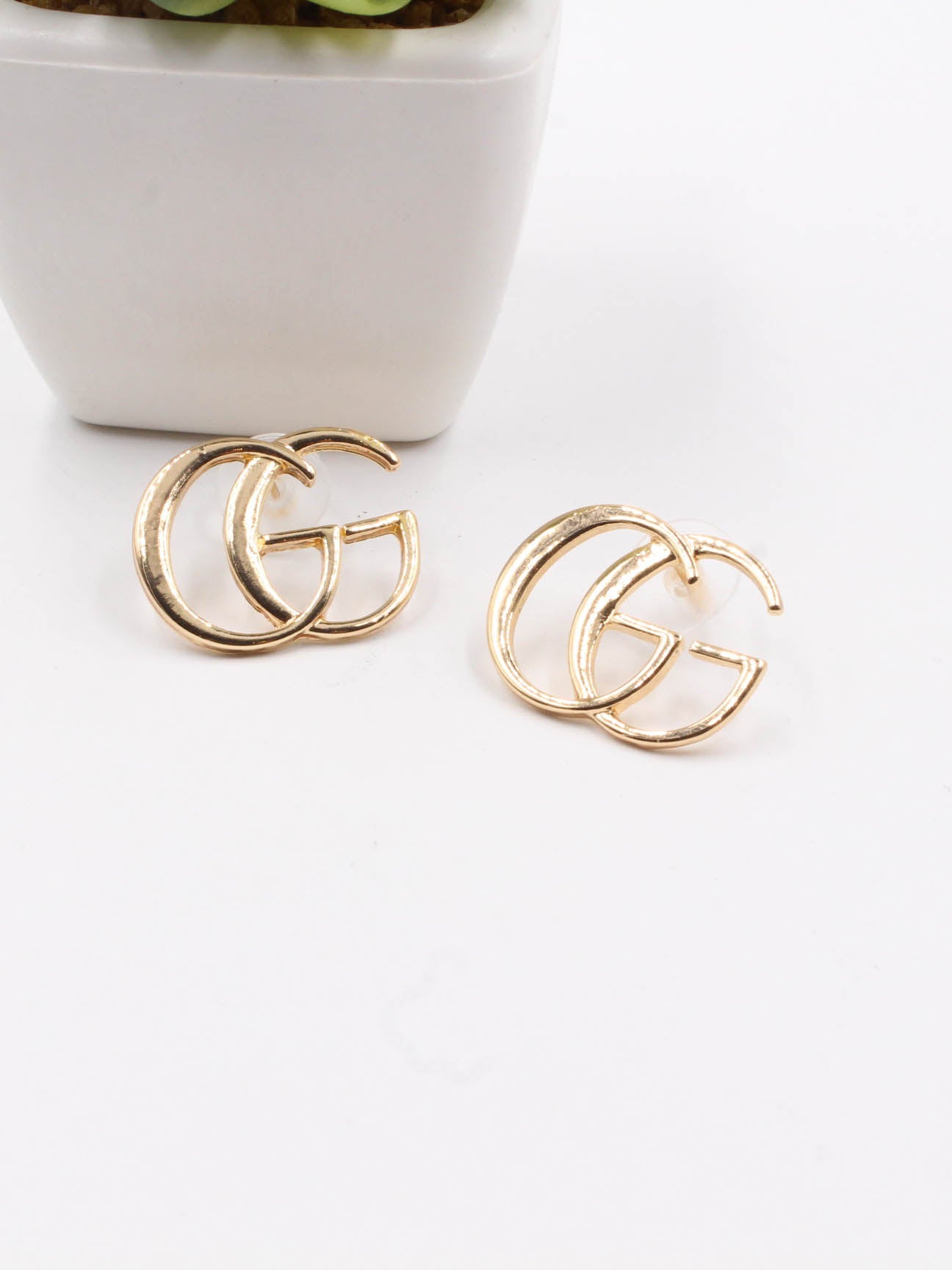 golden gucci earring - حلق قوتشي ذهبي حلق Jewel ذهبي 